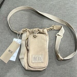Beis The Water Bottle Sling 
in Beige